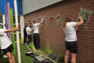 Mary  Wallace  Installing Mosaics At  Newtownmountkennedy  National  School